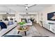 Comfortable living room with furniture and view of dining area and kitchen at 450 Treasure Isle Causeway # 212, Treasure Island, FL 33706