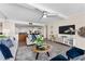Open floorplan featuring living room with furniture and view to dining area and kitchen at 450 Treasure Isle Causeway # 212, Treasure Island, FL 33706