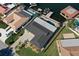 Aerial view of the home showing the lush lawn, landscaping and access to the canal at 5133 Glenn Dr, New Port Richey, FL 34652