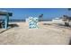 Scenic beach scene with a beach access art installation, offering a delightful coastal experience at 5133 Glenn Dr, New Port Richey, FL 34652