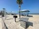Picturesque beach with picnic shelters, charcoal grill and a convenient wash station at 5133 Glenn Dr, New Port Richey, FL 34652