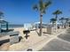 Inviting beach scene featuring picnic areas and a whimsical painted van backdrop for photo opportunities at 5133 Glenn Dr, New Port Richey, FL 34652
