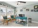 Inviting home office featuring a blue desk with matching chairs providing a creative workspace at 5133 Glenn Dr, New Port Richey, FL 34652