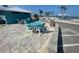 Inviting outdoor seating area with stylish patio furniture near the beach and parking at 5133 Glenn Dr, New Port Richey, FL 34652
