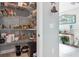 Walk-in pantry with wire shelving provides lots of storage space at 5133 Glenn Dr, New Port Richey, FL 34652