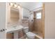 Standard bathroom with sink, toilet, and shower/tub combination at 5720 Mockingbird Dr, New Port Richey, FL 34652