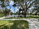 Park view in the neighborhood with bridge over the lake at 5720 Mockingbird Dr, New Port Richey, FL 34652