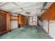 Spacious garage with storage cabinets and utility connections at 5720 Mockingbird Dr, New Port Richey, FL 34652