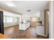 Beautiful kitchen featuring tile floors, white cabinets and stainless steel appliances at 5720 Mockingbird Dr, New Port Richey, FL 34652