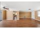 View of spacious open layout showing neutral walls, smooth floors and kitchen access at 5720 Mockingbird Dr, New Port Richey, FL 34652