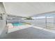 Enclosed pool area with screened-in lanai, offering a comfortable outdoor retreat at 5720 Mockingbird Dr, New Port Richey, FL 34652