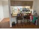 Open kitchen with bar seating and functional layout for easy meal preparation at 6446 71St N St, Pinellas Park, FL 33781