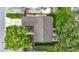 An aerial view of the property showcasing its layout, landscaping, and proximity to neighborhood streets at 6511 3Rd Ne Ave, Bradenton, FL 34208