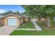 Charming single-story home featuring a one-car garage, well-kept lawn, and appealing curb appeal at 6511 3Rd Ne Ave, Bradenton, FL 34208