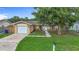 Charming single-story home featuring a one-car garage, well-kept lawn, and appealing curb appeal at 6511 3Rd Ne Ave, Bradenton, FL 34208