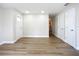 Bright and airy living room with new vinyl plank flooring, fresh paint, and ample natural light at 6511 3Rd Ne Ave, Bradenton, FL 34208
