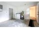 Utility room with washer, dryer, and water heater, offering practicality and functionality at 6511 3Rd Ne Ave, Bradenton, FL 34208