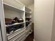 Spacious walk-in closet with ample shelving and storage compartments at 8731 Tantallon Cir, Tampa, FL 33647