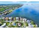Stunning waterfront homes with private docks and lush landscaping in a desirable community at 101 Carlyle Dr, Palm Harbor, FL 34683