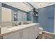 Bathroom features a double vanity and ample storage at 101 Carlyle Dr, Palm Harbor, FL 34683