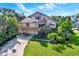 This home has dual decks, a lush yard with mature palms, and a well-kept lawn, offering an ideal Florida lifestyle at 101 Carlyle Dr, Palm Harbor, FL 34683