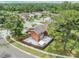 Beautiful residential area featuring a two-story home with a fenced backyard and lush green surroundings at 10520 Winrock Pl, Tampa, FL 33624