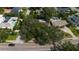 A beautiful shot of the neighborhood highlights the lush greenery and nearby houses at 1100 Snell Isle Ne Blvd, St Petersburg, FL 33704
