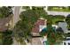 This aerial view showcases the property's pool, landscaping, and proximity to the road at 1100 Snell Isle Ne Blvd, St Petersburg, FL 33704