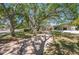 Inviting single-story home with a brick paved driveway and lush lawn leading to the entrance at 1100 Snell Isle Ne Blvd, St Petersburg, FL 33704