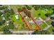 Aerial view of the property with a large open backyard and tree coverage at 1105 Branch Acres Dr, Plant City, FL 33565