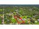 Aerial view of the property with a large open backyard and tree coverage at 1105 Branch Acres Dr, Plant City, FL 33565