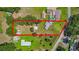 Aerial view of the property with a large open backyard and tree coverage at 1105 Branch Acres Dr, Plant City, FL 33565