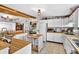 Bright and functional kitchen with updated appliances and a breakfast bar at 1105 Branch Acres Dr, Plant City, FL 33565