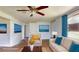Inviting living room with contemporary decor and comfortable seating at 12113 Victory Dr, Hudson, FL 34667