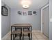 Charming dining area featuring a modern table with seating and elegant wall decor at 124 E Virginia Ln, Clearwater, FL 33759