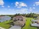 Aerial view of the home on large manicured lot with two car garage at 12915 Carlington Ln, Riverview, FL 33579