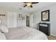 Comfortable bedroom featuring a ceiling fan, neutral color scheme, and carpet at 12915 Carlington Ln, Riverview, FL 33579