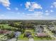 Charming two-story home features manicured lawn, lush landscaping, and a welcoming curb appeal at 12915 Carlington Ln, Riverview, FL 33579