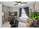 This sitting room features a media center, window bench, and comfortable seating at 12915 Carlington Ln, Riverview, FL 33579