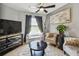 Relaxing sitting room with a view, chairs, and modern decor at 12915 Carlington Ln, Riverview, FL 33579
