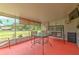 Inviting screened patio with outdoor furniture, perfect for enjoying the outdoor view at 13311 Omega Ct, Dade City, FL 33525