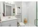 Clean bathroom featuring a glass-door shower, modern vanity, toilet, and a neutral color palette at 14672 Horse Trot Rd, Lithia, FL 33547