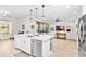 Bright and airy kitchen featuring stainless steel appliances and an open layout at 14672 Horse Trot Rd, Lithia, FL 33547