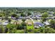 An aerial shot of a neighborhood with diverse homes and lots of large, mature trees at 2017 Waikiki Way, Tampa, FL 33619