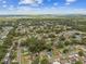 Expansive aerial view of a residential neighborhood with tree-lined streets and a mix of single-Gathering homes at 2027 Balfour Cir, Tampa, FL 33619