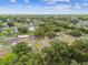 This aerial view showcases the neighborhood's tree-lined streets and well-maintained homes at 2027 Balfour Cir, Tampa, FL 33619