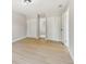 Bright bedroom boasts neutral paint, light flooring, ample closet space, and an en suite bathroom at 2027 Balfour Cir, Tampa, FL 33619