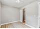 Comfortable bedroom features neutral paint, light flooring, and a closet with ample storage space at 2027 Balfour Cir, Tampa, FL 33619