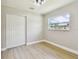 Cozy bedroom with ample closet space, new floors, and great natural light at 2027 Balfour Cir, Tampa, FL 33619