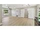 Spacious living room area with new floors, great natural light, and closet at 2027 Balfour Cir, Tampa, FL 33619